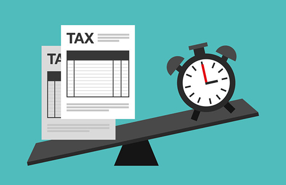 Graphic of tax papers and a ticking clock